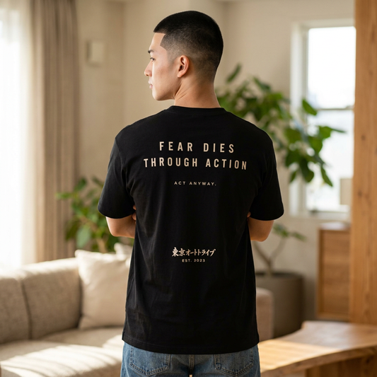 Motivational Oversized Tee — "Fear Dies Through Action" Graphic