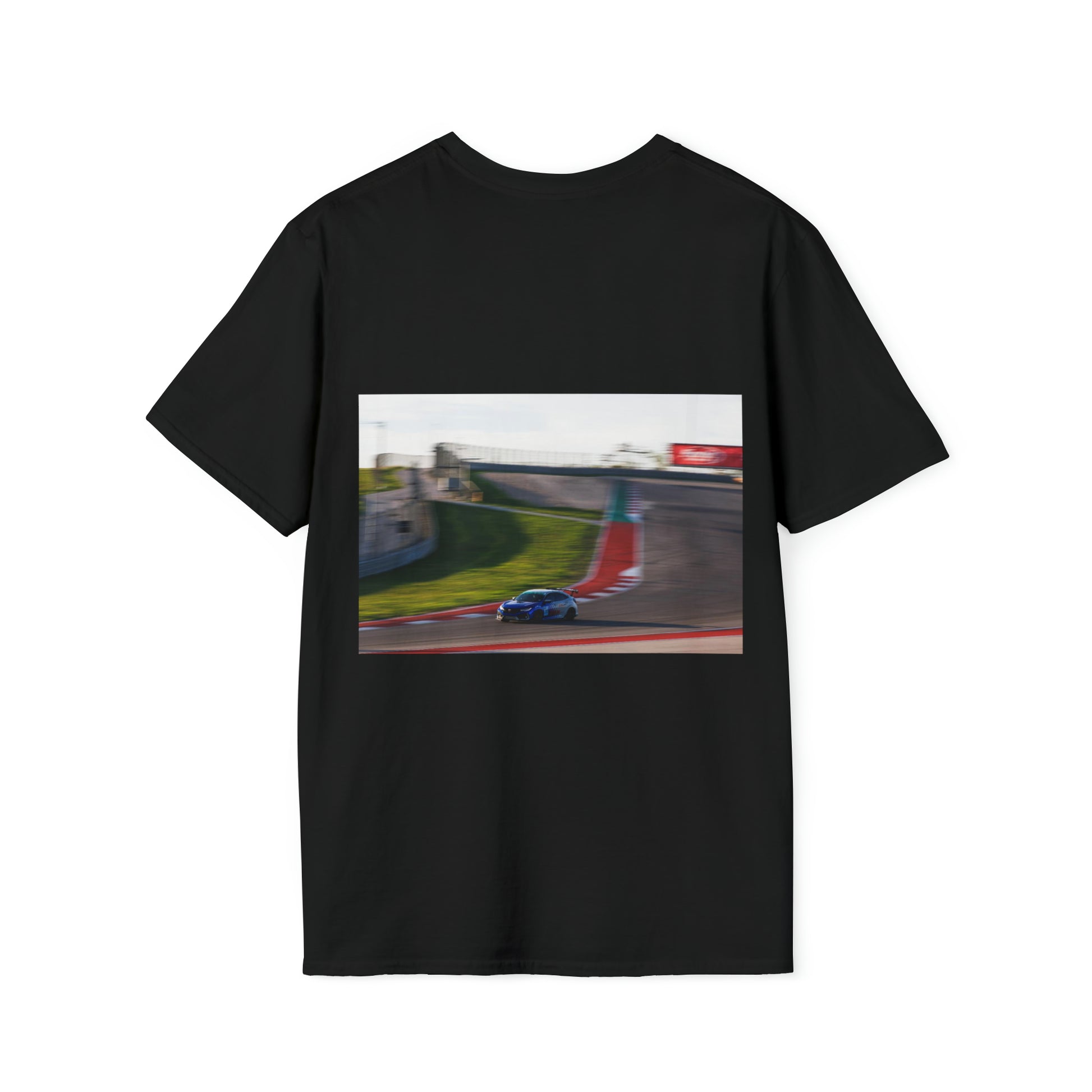 Black Unisex Softstyle T-Shirt featuring a blurred motion graphic of a blue car racing on a sunny track, capturing the thrill of Japanese car culture and late-night drives.