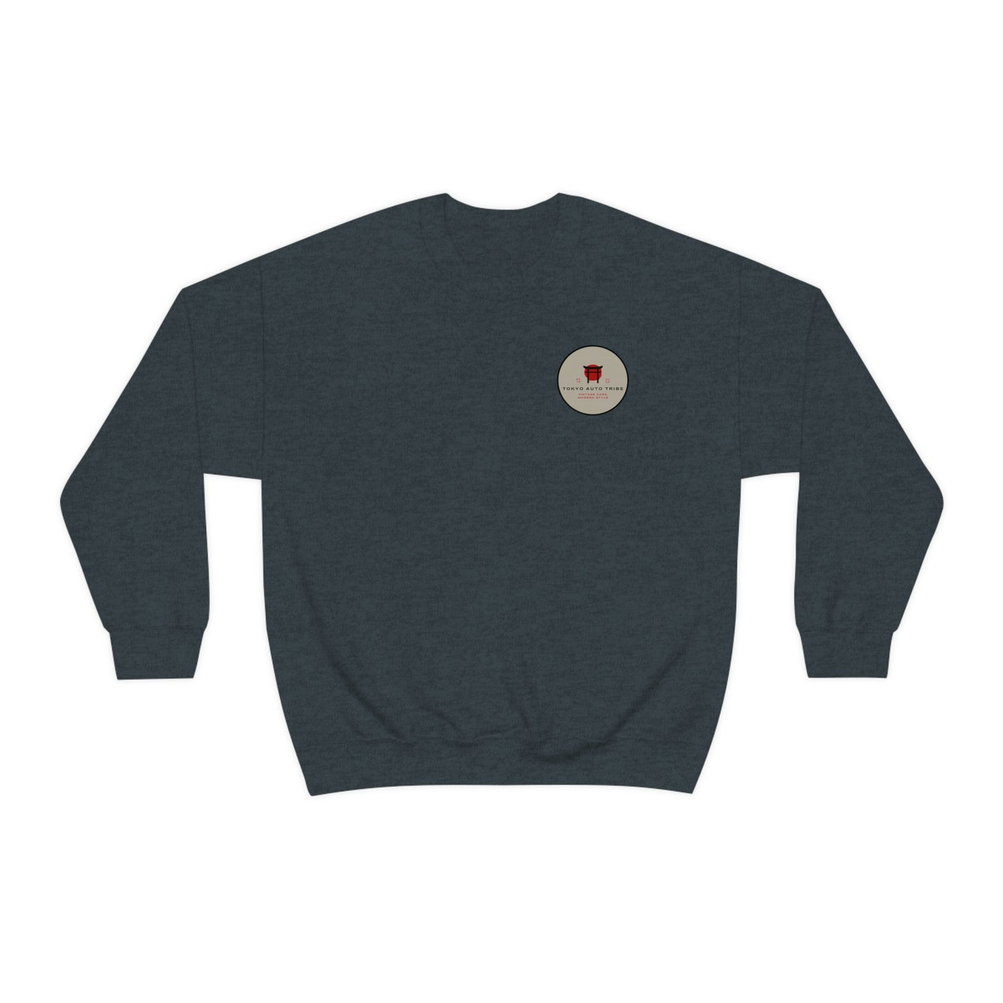 The Family Wagon Sweater in dark heather gray with a small circular emblem featuring a red graphic and text, capturing the spirit of Japanese car culture and late-night drives.