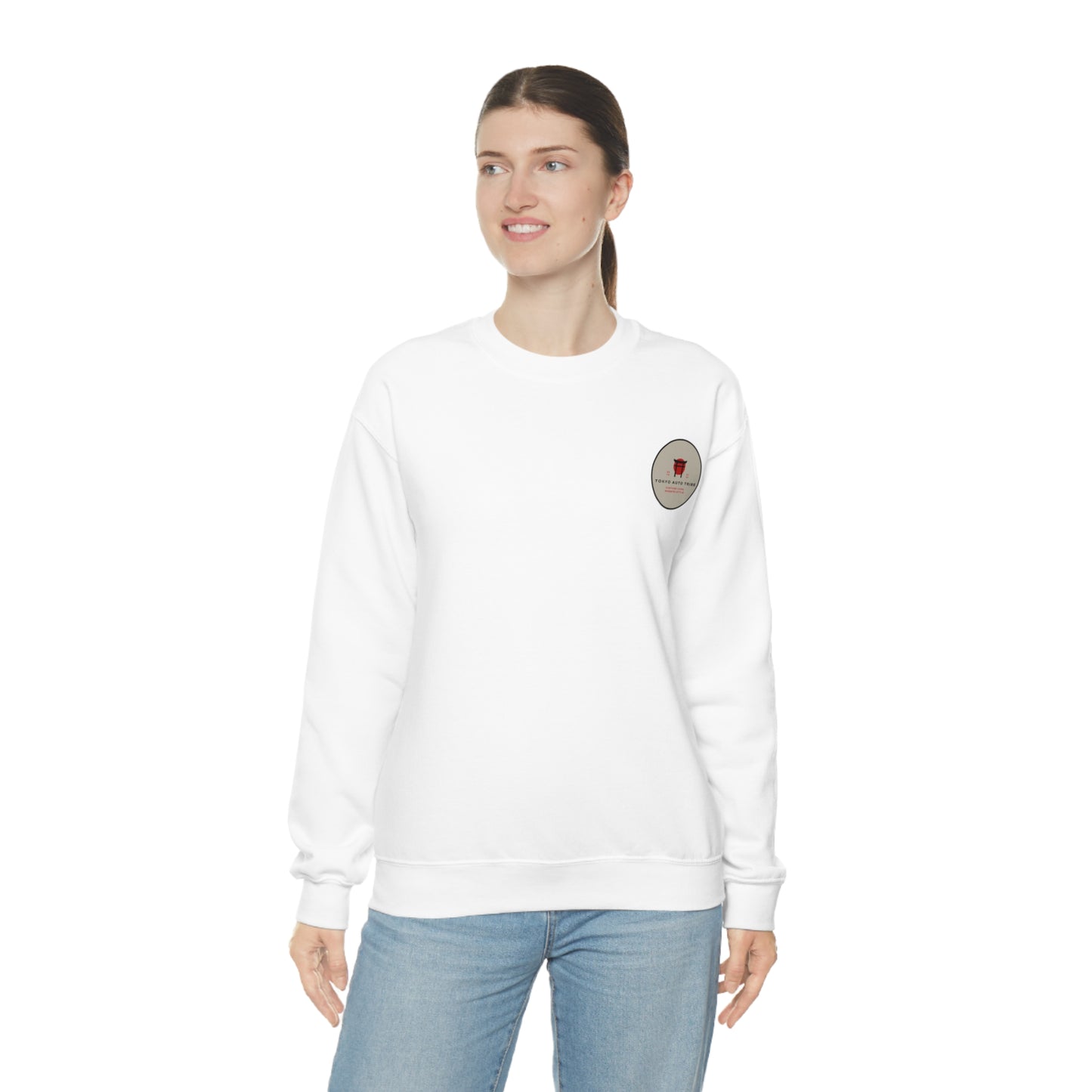 Woman wearing a white Wagon Chibi Sweater with a small graphic emblem on the chest, styled casually with light blue jeans, embodying Japanese car culture and late-night drives.
