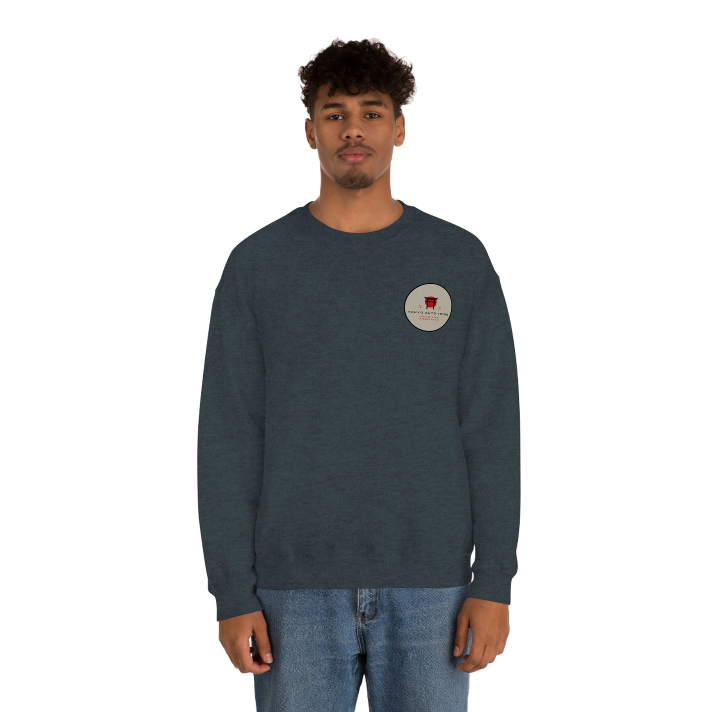 Man wearing The Family Wagon Sweater in dark blue, featuring a small round graphic on the chest embracing Japanese car culture inspired by late-night drives and tuner scene lifestyle.