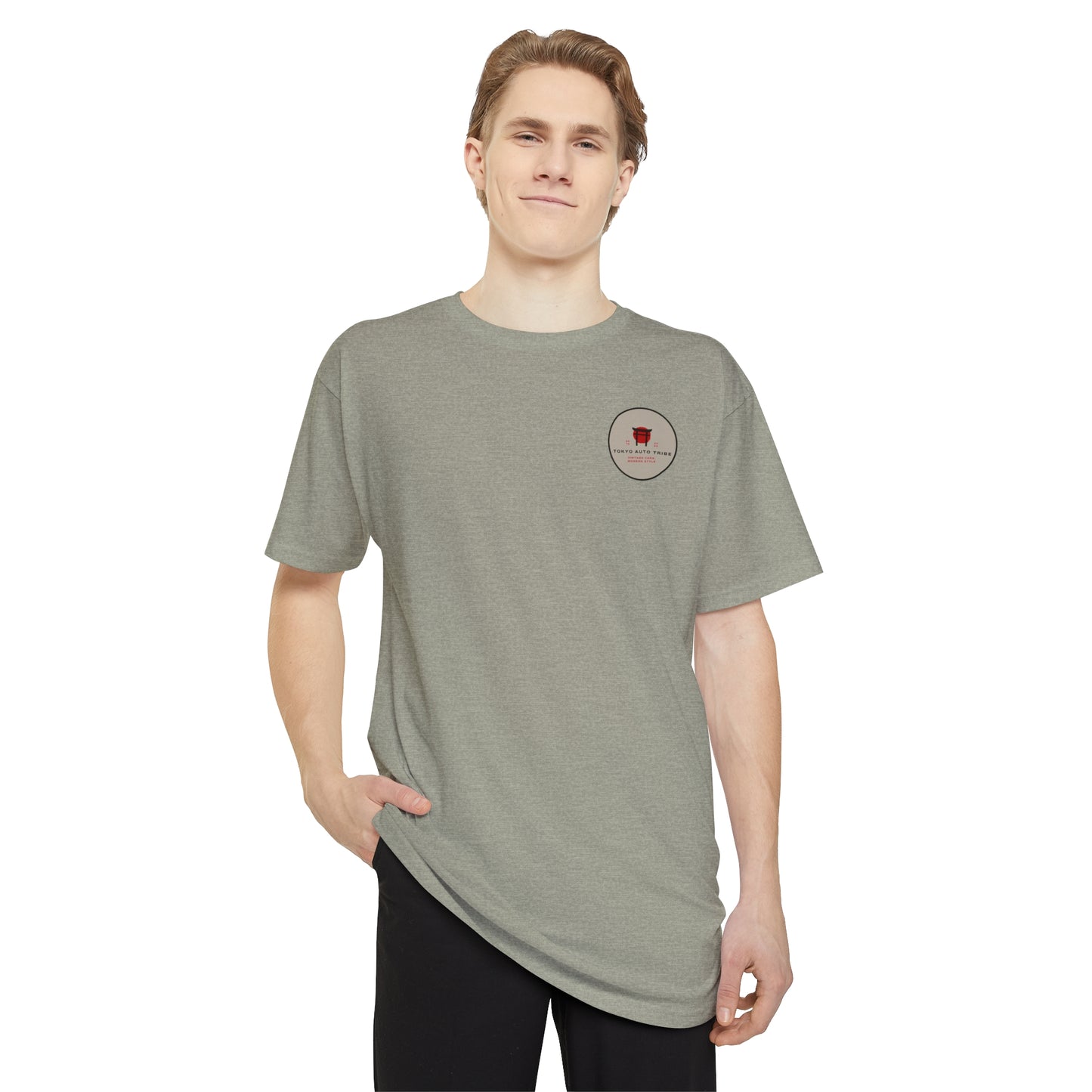 Young man wearing a gray Unbreakable Spirit oversized T-Shirt, embodying the late-night drives and Japanese car culture spirit with a relaxed fit and minimalist design.