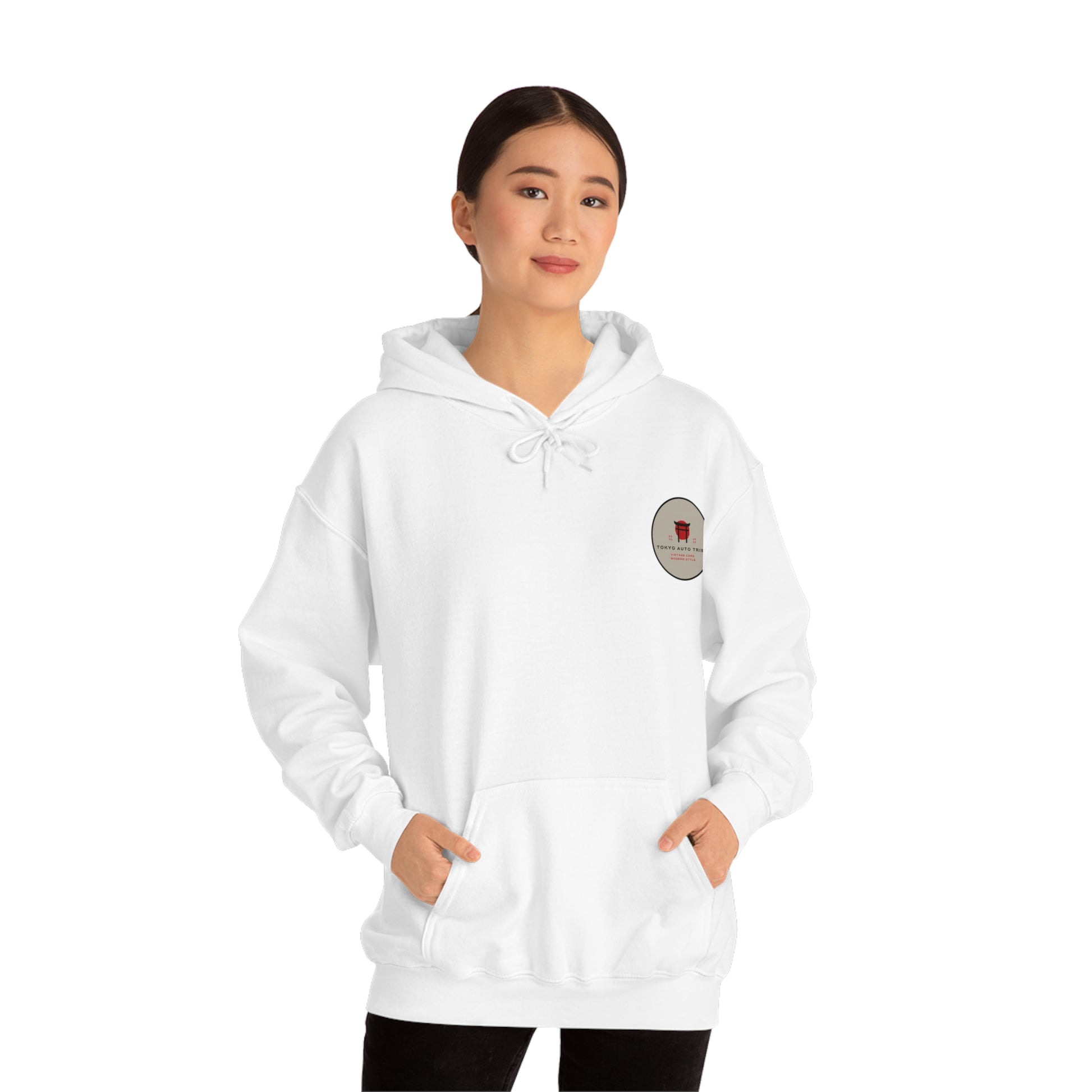 A woman wearing a white Wagon Chibi Hoodie with a small graphic on the chest, featuring a clean design inspired by Japanese car culture and streetwear style.