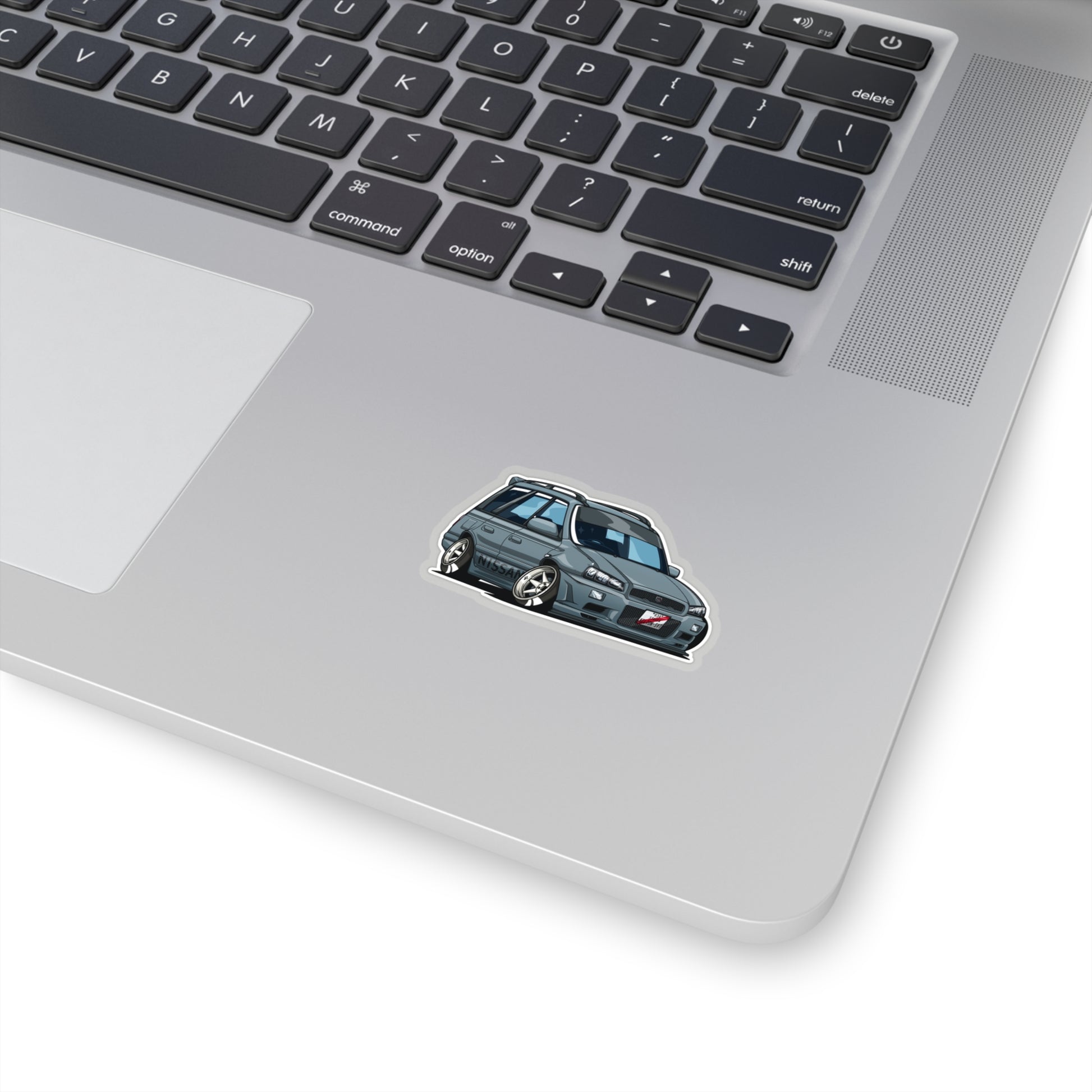 Wagon Wonder Sticker featuring a stylized, lowered Japanese station wagon with vintage tuner car design, perfect for fans of Tokyo Auto Tribe and JDM car culture.