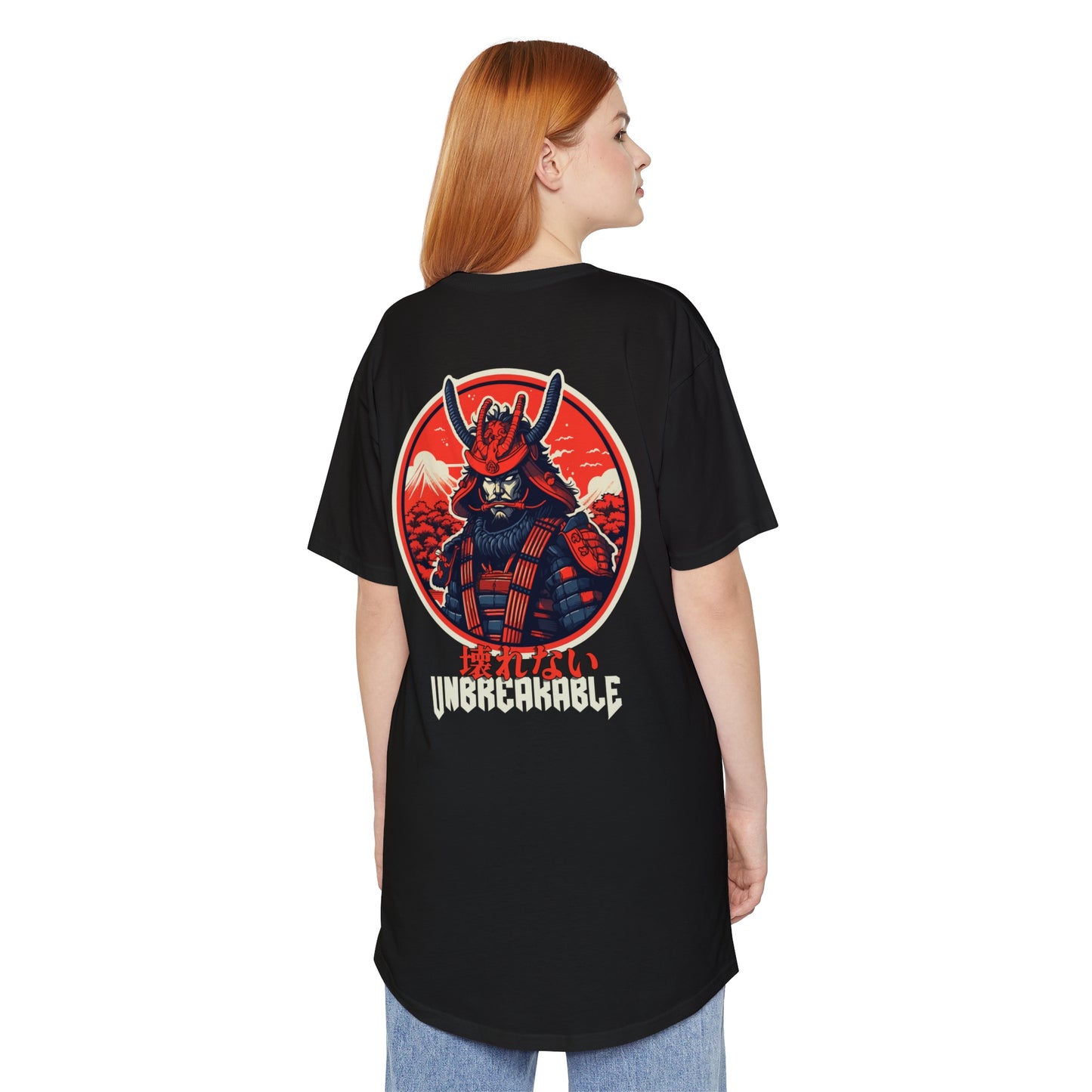 Woman wearing a black Unbreakable Spirit oversized T-Shirt featuring a vibrant graphic of a samurai cat in traditional armor against a red sun and mountain backdrop, embodying Japanese car culture and tuner streetwear style.