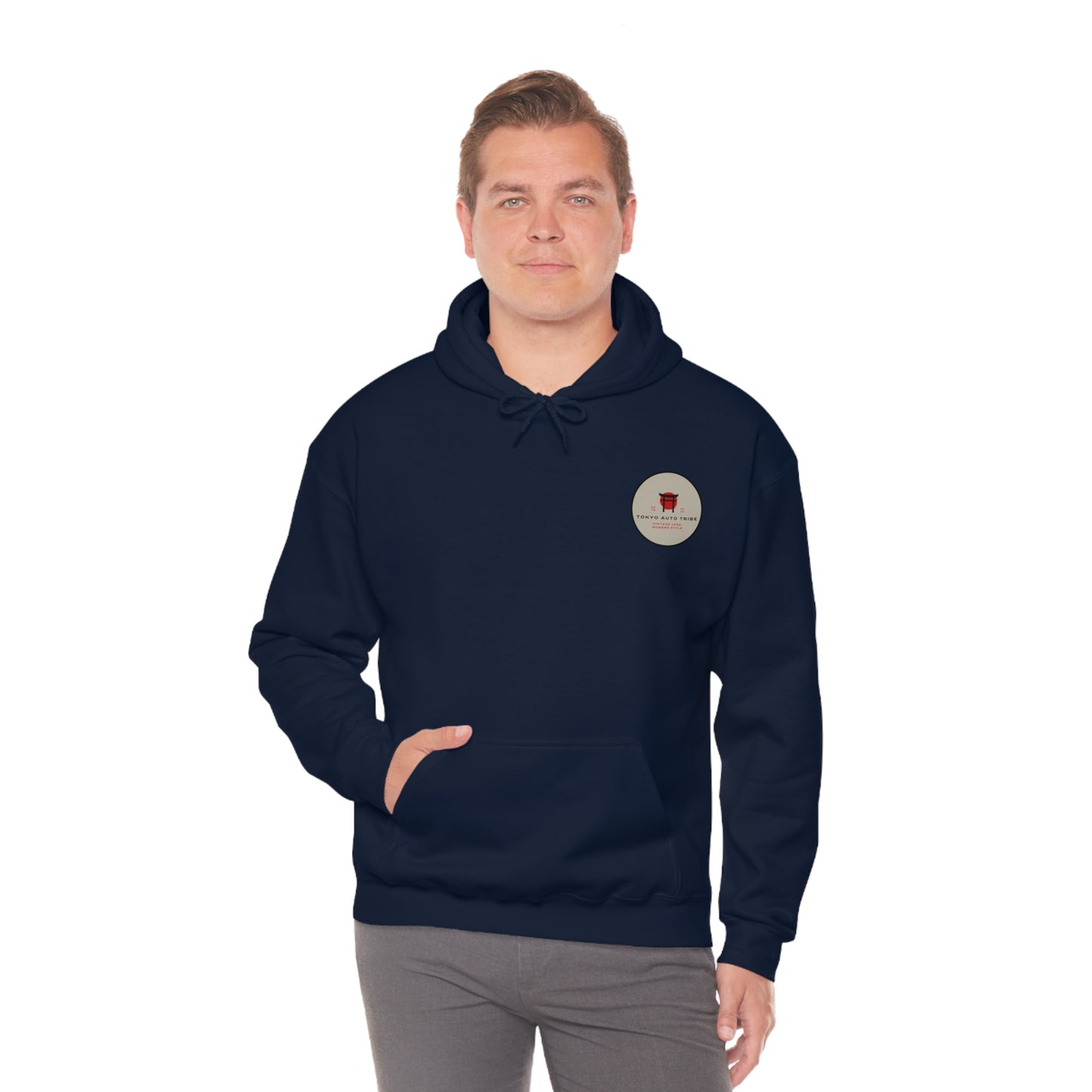 Man wearing a navy blue Wagon Chibi Hoodie with a small graphic on the chest, styled for fans of Japanese car culture, late-night drives, and tuner streetwear.
