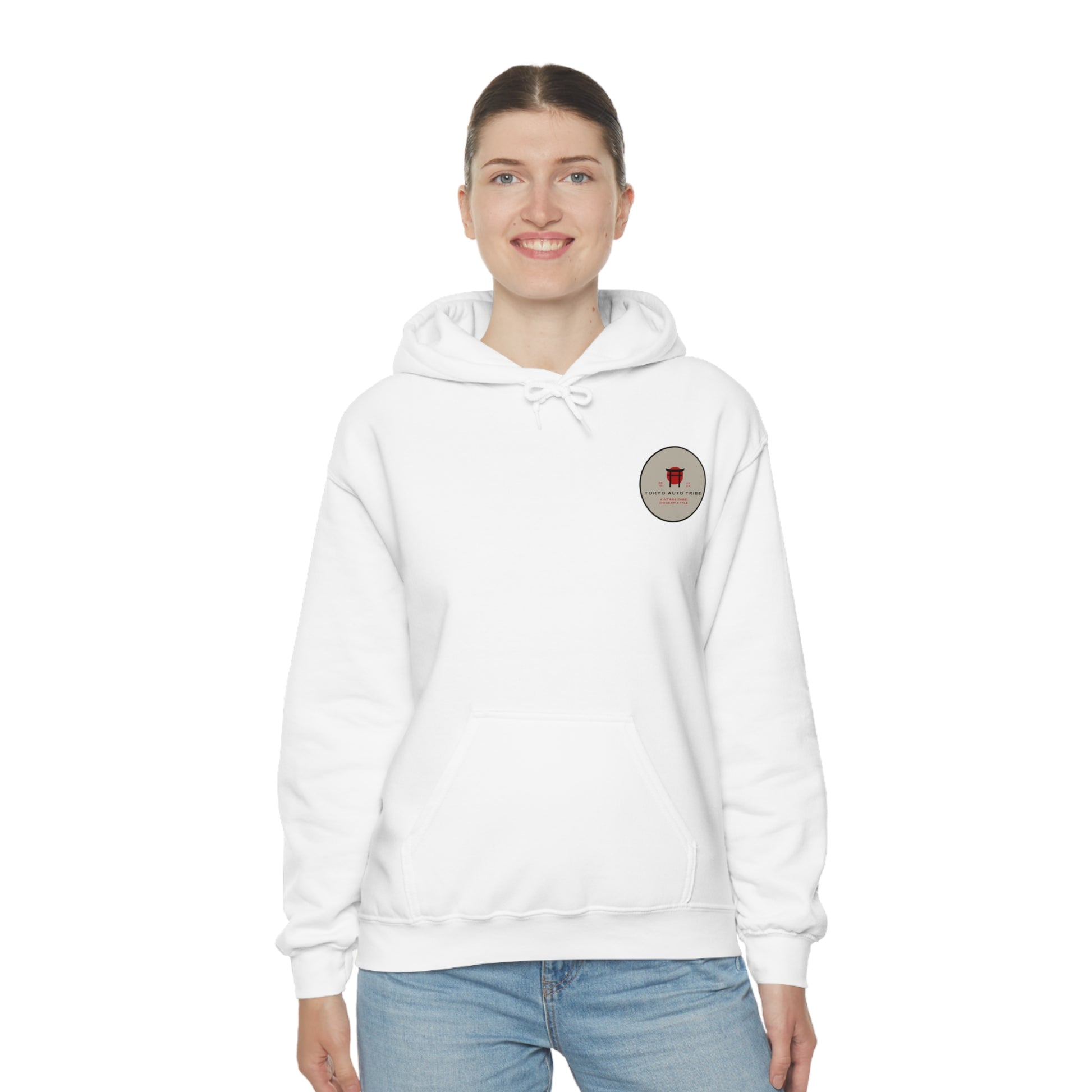 Woman wearing a white Wagon Chibi Hoodie featuring a small circular logo on the chest, blending JDM streetwear style with Japanese car culture and tuner-inspired design.
