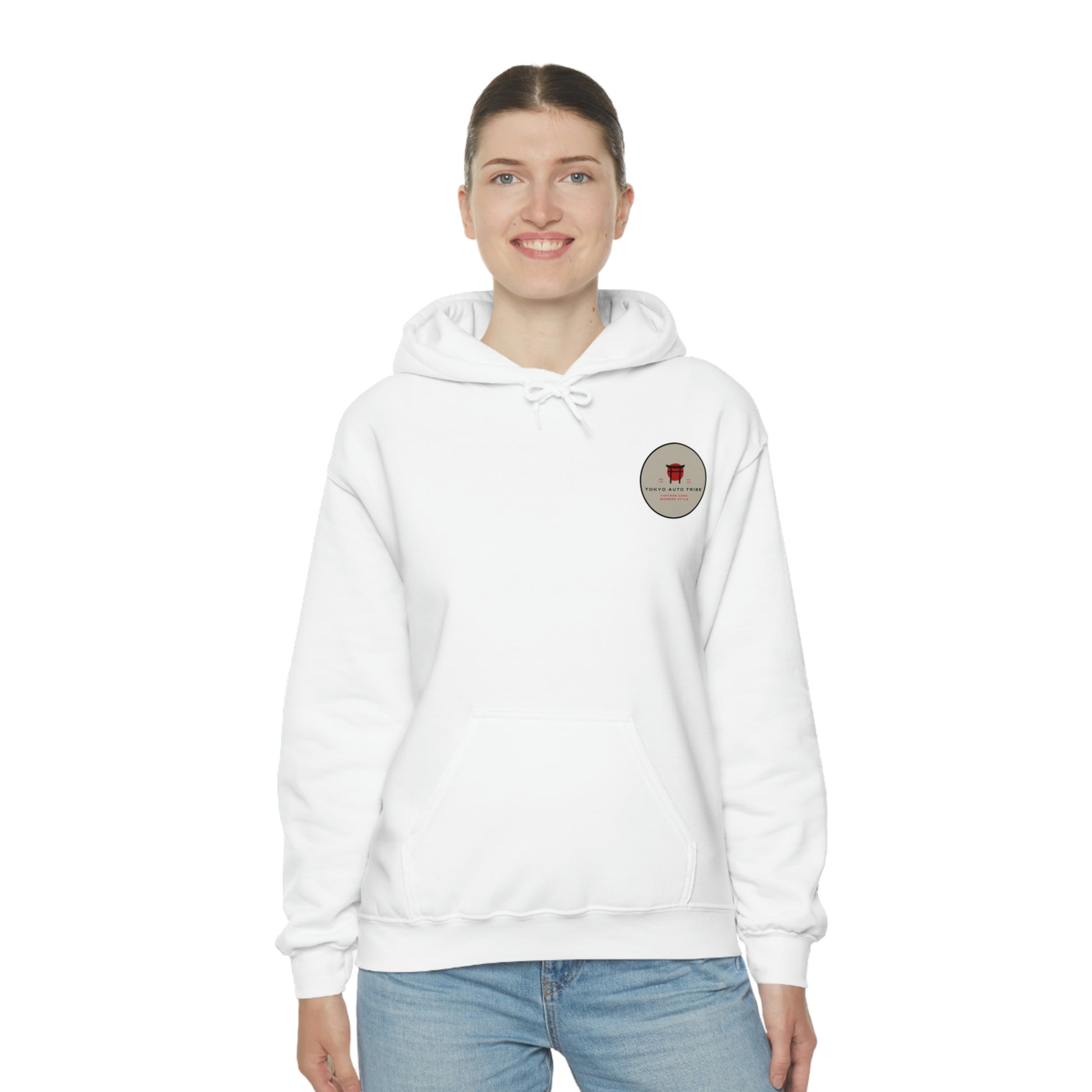 Smiling woman wearing a white Groovy Grocery Runner Hoodie featuring a small vintage-inspired logo on the chest, embodying Japanese car culture and late-night drive style.