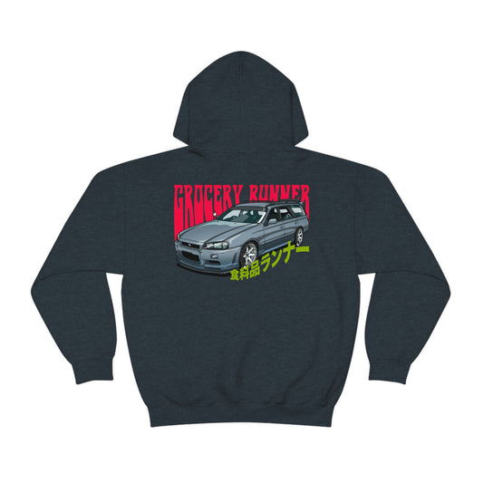 Dark hoodie featuring a detailed graphic of a silver JDM hatchback car with bold red and yellow "Grocery Runner" text, celebrating Japanese car culture in the Groovy Grocery Runner Hoodie.