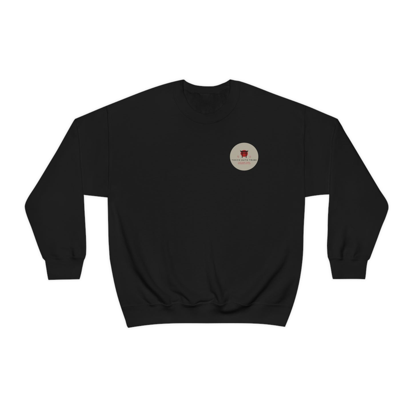 The Family Wagon Sweater in black, featuring a small circular emblem with a red graphic and text on the chest, designed for fans of Japanese car culture and late-night drives.