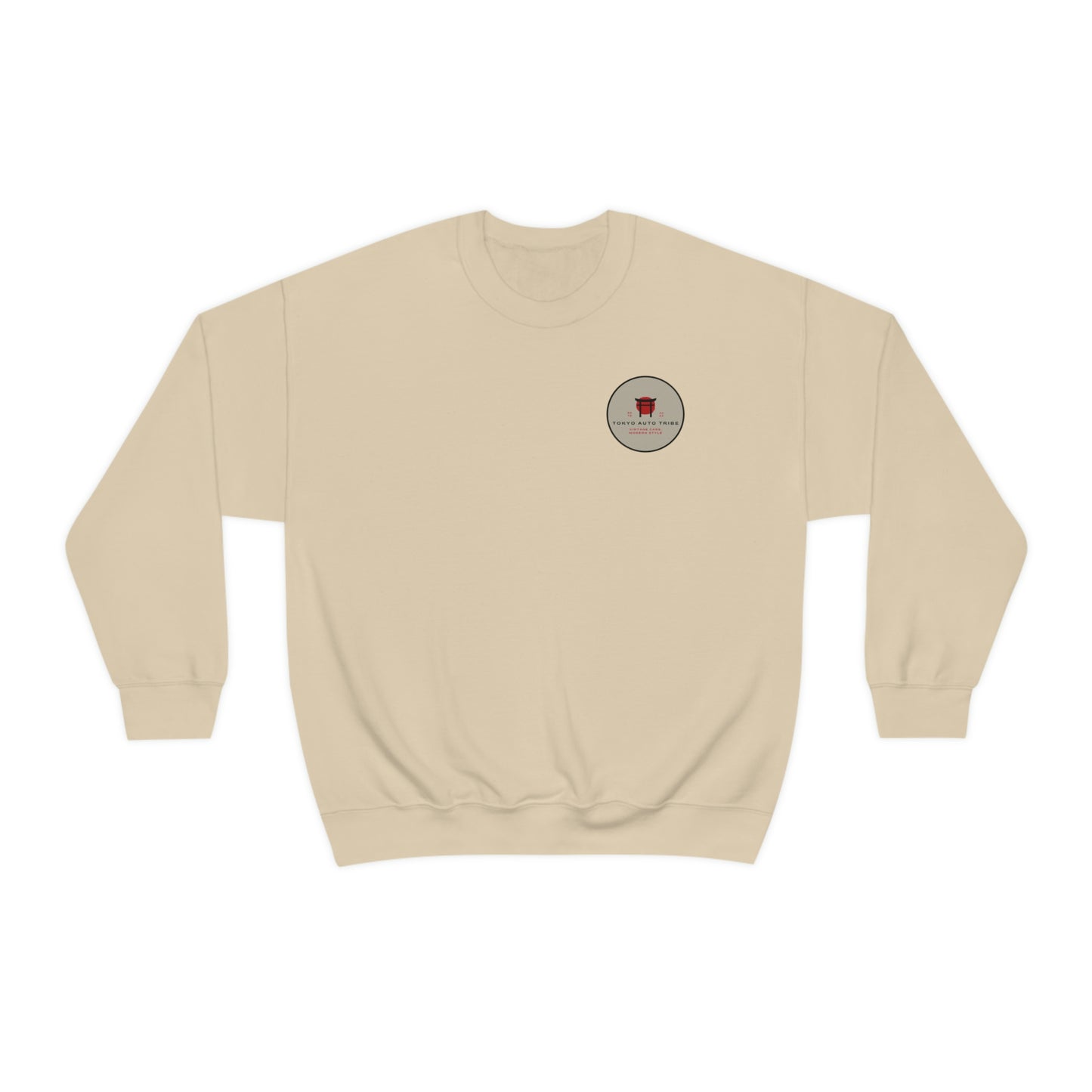The Family Wagon Sweater in beige, featuring a small, round vintage-inspired graphic with a red car emblem and Japanese car culture text, perfect for enthusiasts of tuner culture and late-night drives.
